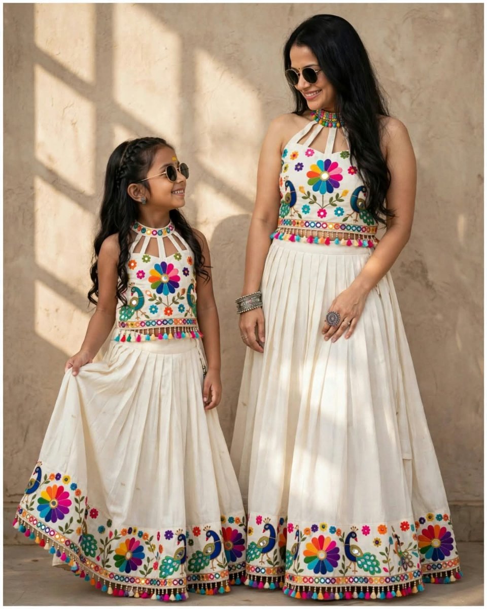 Sanjanaa Arole Mom and Daughter Matching Navratri Lehenga - Off White Halter Neck Embroidered Top with Rainbow Flower Peacock and Flared Lehenga Skirt with Tassel Border AI Prompt Visual